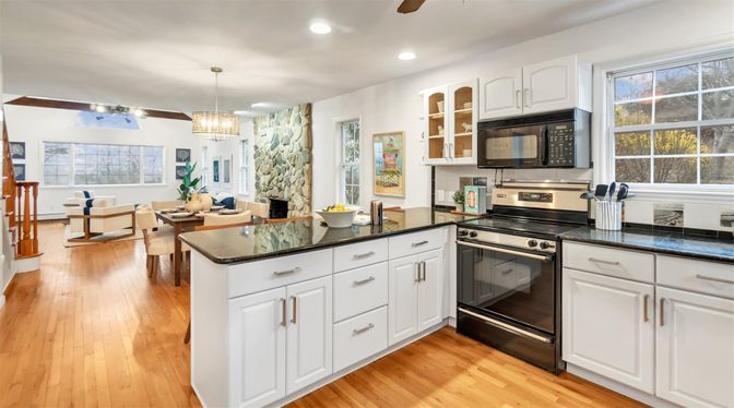 Chandelier, Dining room, Interior, Kitchen, Living room, Recessed Lighting, Stainless Steel Appliances, Wood Texture Flooring
