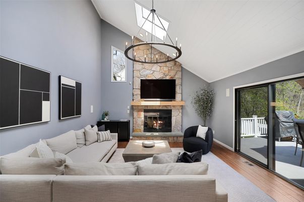 Fireplace, Interior, Living room, Pendant Lights, Stone Walls, Wood Texture Flooring