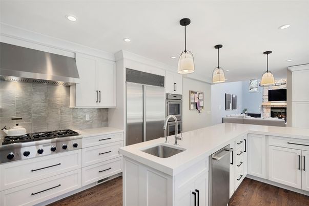 Fireplace, Interior, Kitchen, Pendant Lights, Recessed Lighting, Stainless Steel Appliances, Wood Texture Flooring