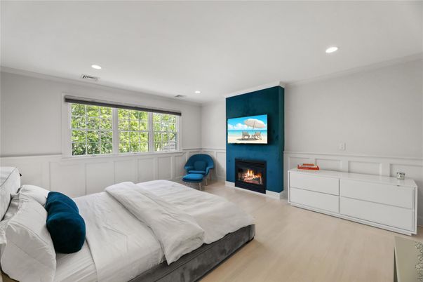Bedroom, Fireplace, Interior, Recessed Lighting, Wood Texture Flooring