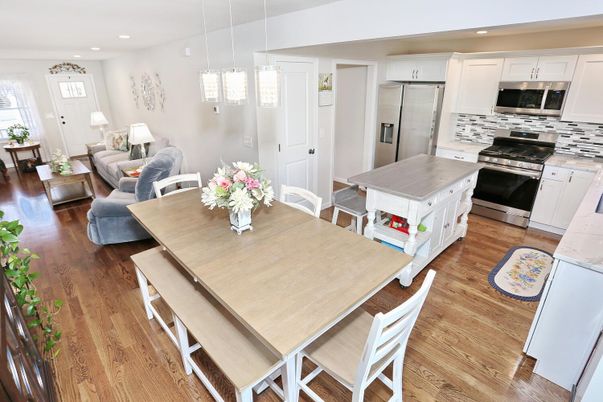 Dining room, Interior, Kitchen, Living room, Pendant Lights, Recessed Lighting, Stainless Steel Appliances, Wood Texture Flooring