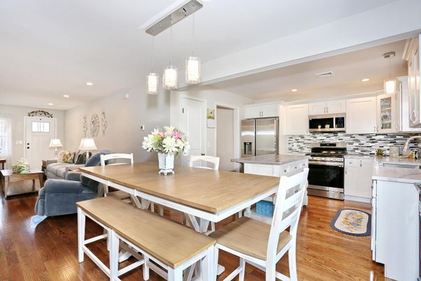 Dining room, Interior, Kitchen, Living room, Pendant Lights, Recessed Lighting, Stainless Steel Appliances, Wood Texture Flooring
