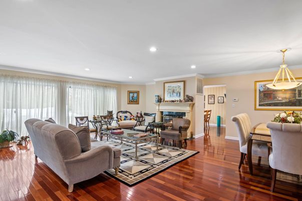 Dining room, Fireplace, Interior, Living room, Pendant Lights, Recessed Lighting, Wood Texture Flooring