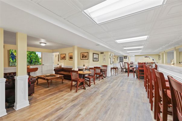 Dining room, Fireplace, Interior, Living room, Recessed Lighting, Wood Texture Flooring