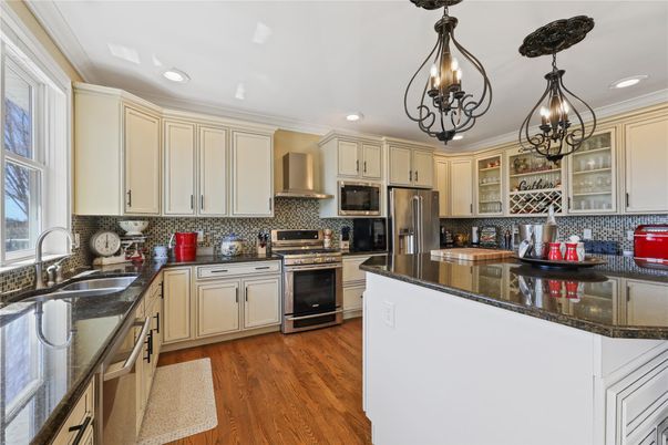 Chandelier, Interior, Kitchen, Recessed Lighting, Stainless Steel Appliances, Wood Texture Flooring