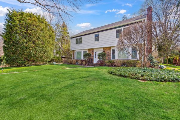 Attached, Backyard, Exterior, Facade, Brick Facade, Raised Ranch