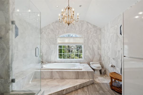 Bathroom, Chandelier, Glass Shower, Interior, Marble Walls, Recessed Lighting, Wood Texture Flooring