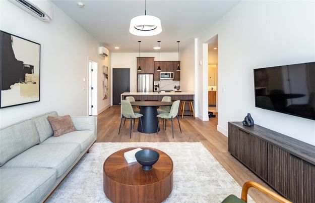 Dining room, Interior, Kitchen, Living room, Pendant Lights, Recessed Lighting, Stainless Steel Appliances, Wood Texture Flooring