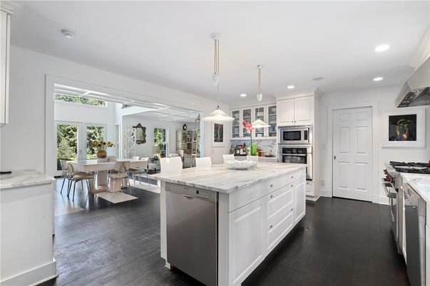 Dining room, Interior, Kitchen, Pendant Lights, Recessed Lighting, Stainless Steel Appliances, Wood Texture Flooring