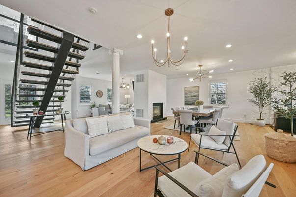 Chandelier, Dining room, Fireplace, Interior, Living room, Pendant Lights, Recessed Lighting, Wood Texture Flooring