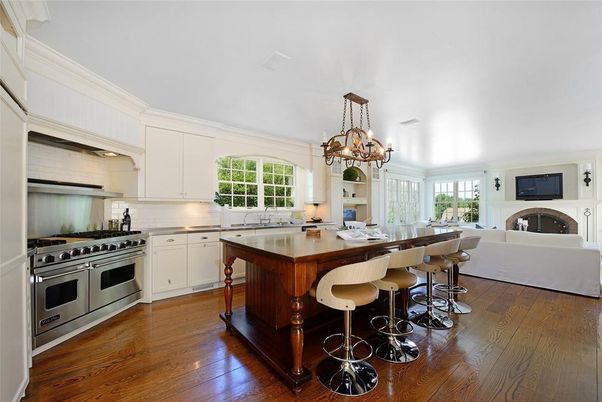 Chandelier, Fireplace, Interior, Kitchen, Stainless Steel Appliances, Wood Texture Flooring