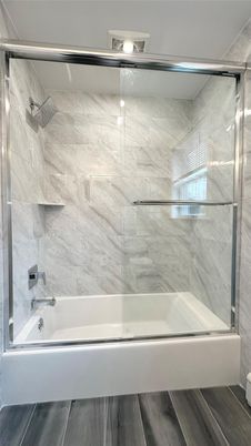 Bathroom, Glass Shower, Interior, Marble Walls, Wood Texture Flooring