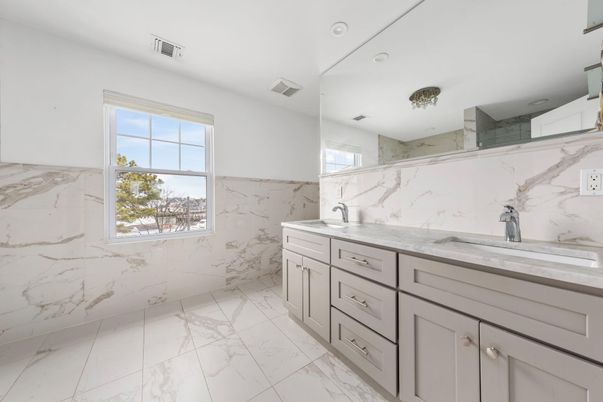 Bathroom, Dual Sink Vanities, Interior, Marble, Marble Walls, Recessed Lighting