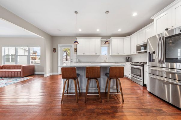 Interior, Kitchen, Pendant Lights, Recessed Lighting, Stainless Steel Appliances, Wood Texture Flooring