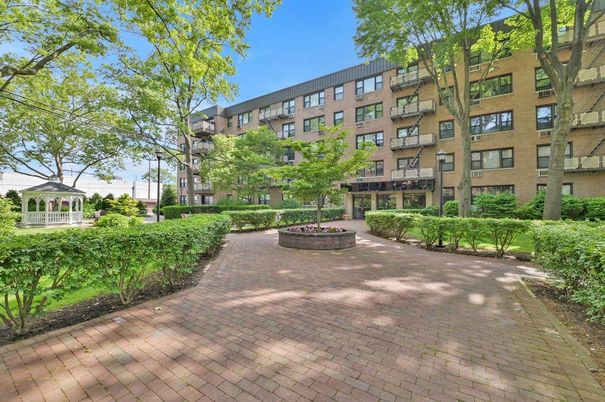 Backyard, Exterior, Facade, Brick Facade, Condo Building