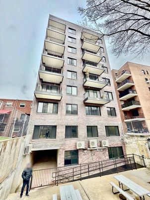Exterior, Facade, Brick Facade, Condo Building