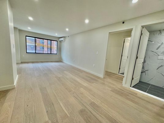 Empty room, Interior, Marble Walls, Recessed Lighting, Wood Texture Flooring