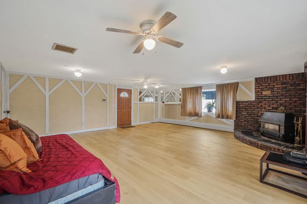 Bedroom, Fireplace, Interior, Stone Walls, Wood Texture Flooring