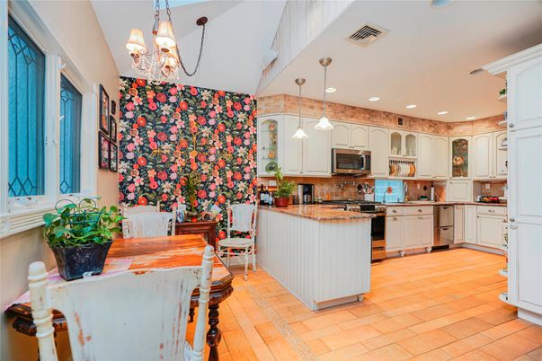 Chandelier, Dining room, Interior, Kitchen, Pendant Lights, Recessed Lighting, Stainless Steel Appliances
