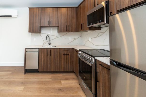 Interior, Kitchen, Marble Walls, Stainless Steel Appliances, Wood Texture Flooring