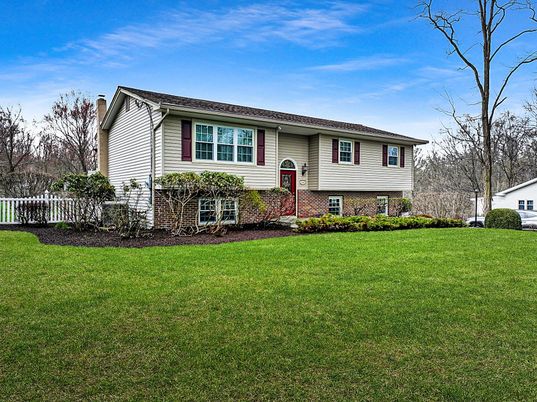 Backyard, Exterior, Facade, Brick Facade, Raised Ranch