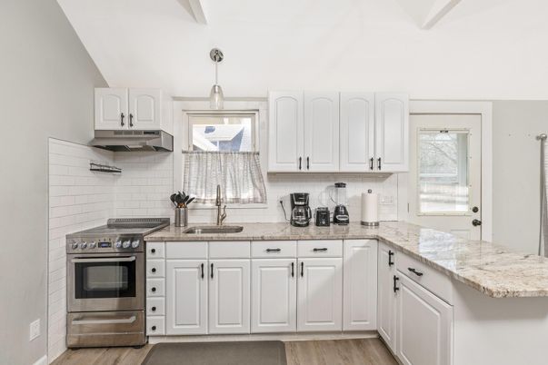 Interior, Kitchen, Pendant Lights, Stainless Steel Appliances, Wood Texture Flooring