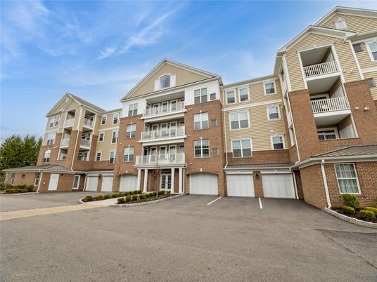 Attached, Exterior, Facade, Brick Facade, Condo Building