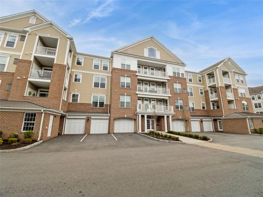 Attached, Exterior, Facade, Brick Facade, Condo Building