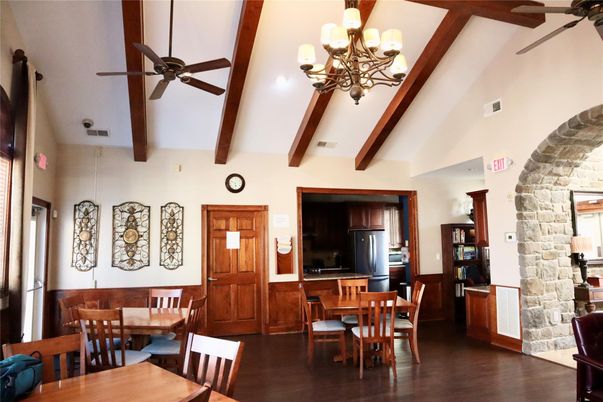 Chandelier, Dining room, Interior, Kitchen, Recessed Lighting, Stone Walls, Wooden Beams, Wood Texture Flooring