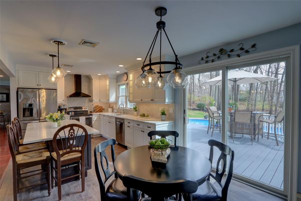 Dining room, Interior, Kitchen, Pendant Lights, Recessed Lighting, Stainless Steel Appliances, Wood Texture Flooring