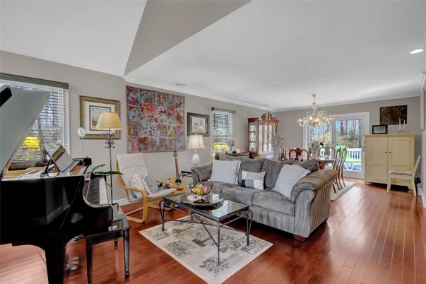 Chandelier, Dining room, Interior, Living room, Piano, Recessed Lighting, Wood Texture Flooring