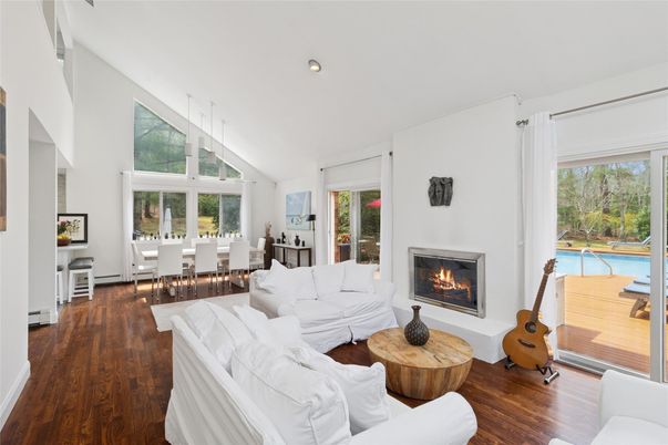 Dining room, Fireplace, Interior, Living room, Pendant Lights, Recessed Lighting, Wood Texture Flooring