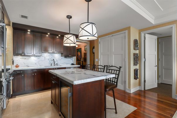 Interior, Kitchen, Marble Walls, Pendant Lights, Recessed Lighting, Wood Texture Flooring