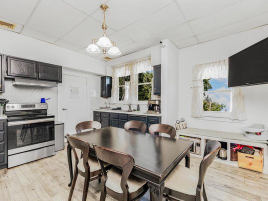 Dining room, Interior, Kitchen, Pendant Lights, Stainless Steel Appliances, Wood Texture Flooring
