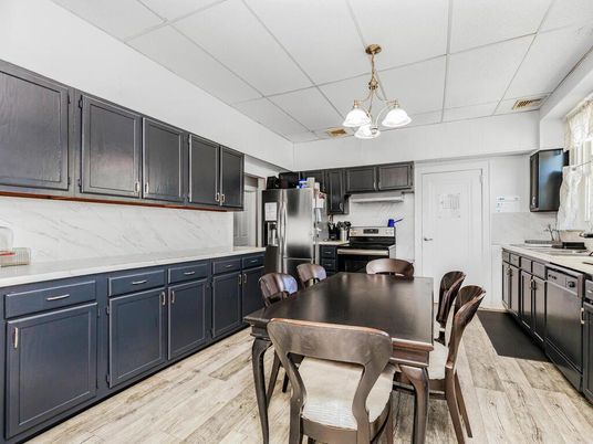 Dining room, Interior, Kitchen, Pendant Lights, Stainless Steel Appliances, Wood Texture Flooring