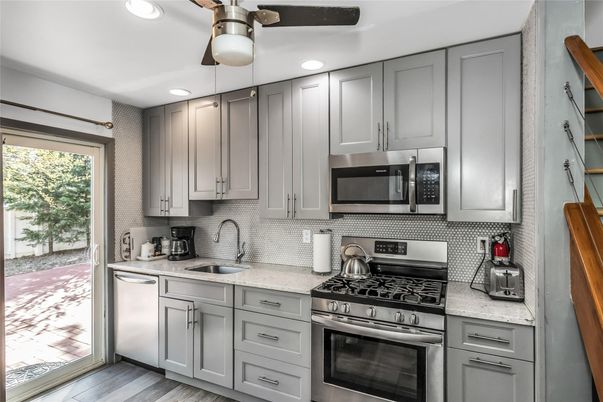 Interior, Kitchen, Recessed Lighting, Stainless Steel Appliances, Wood Texture Flooring