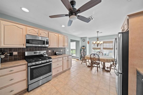 Chandelier, Dining room, Interior, Kitchen, Recessed Lighting, Stainless Steel Appliances