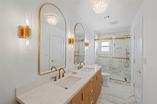 Bathroom, Chandelier, Dual Sink Vanities, Glass Shower, Interior, Marble, Marble Walls