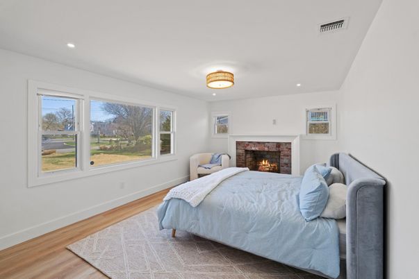 Bedroom, Fireplace, Interior, Recessed Lighting, Wood Texture Flooring