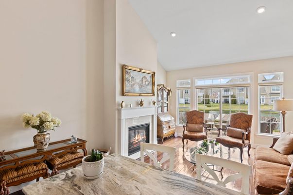 Dining room, Fireplace, Interior, Living room, Recessed Lighting, Wood Texture Flooring