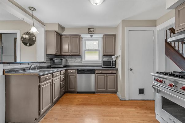 Interior, Kitchen, Pendant Lights, Stainless Steel Appliances, Wood Texture Flooring