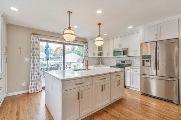 Interior, Kitchen, Pendant Lights, Recessed Lighting, Stainless Steel Appliances, Wood Texture Flooring