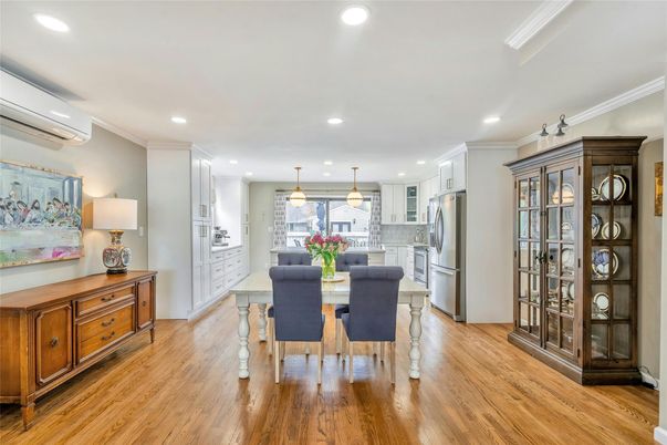 Dining room, Interior, Kitchen, Pendant Lights, Recessed Lighting, Stainless Steel Appliances, Wood Texture Flooring