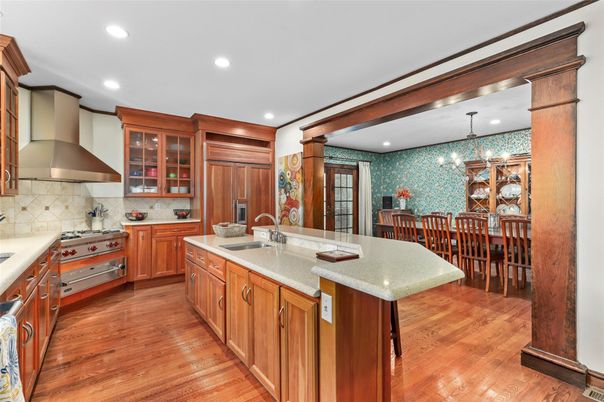 Chandelier, Dining room, Interior, Kitchen, Recessed Lighting, Stainless Steel Appliances, Wood Texture Flooring