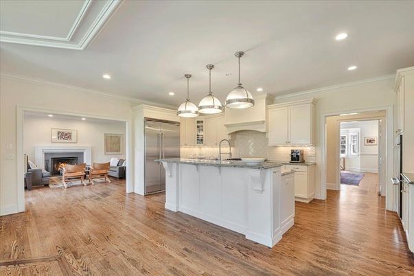 Dining room, Fireplace, Interior, Kitchen, Living room, Pendant Lights, Recessed Lighting, Stainless Steel Appliances, Wood Texture Flooring