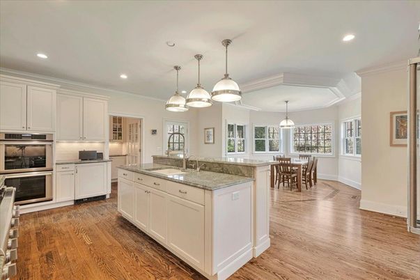 Dining room, Interior, Kitchen, Pendant Lights, Recessed Lighting, Stainless Steel Appliances, Wood Texture Flooring