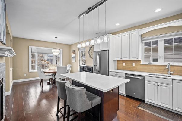 Chandelier, Dining room, Interior, Kitchen, Pendant Lights, Recessed Lighting, Stainless Steel Appliances, Wood Texture Flooring