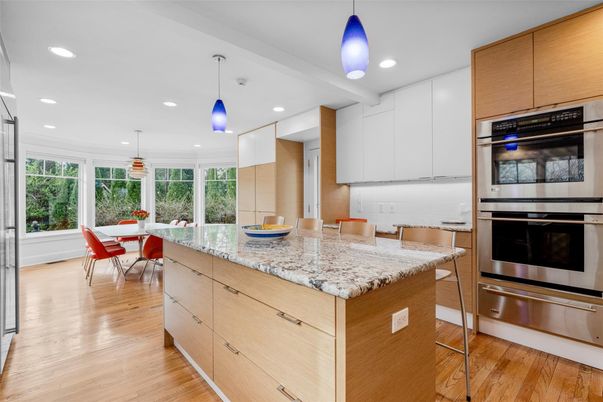 Dining room, Interior, Kitchen, Pendant Lights, Recessed Lighting, Stainless Steel Appliances, Wood Texture Flooring