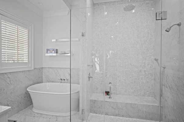 Bathroom, Free Standing Baths, Glass Shower, Interior, Marble Walls, Recessed Lighting