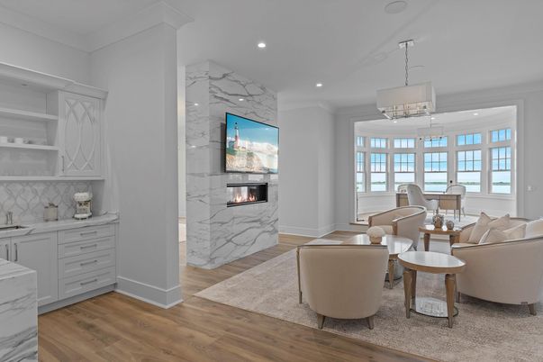Fireplace, Interior, Living room, Marble Walls, Pendant Lights, Recessed Lighting, Wood Texture Flooring